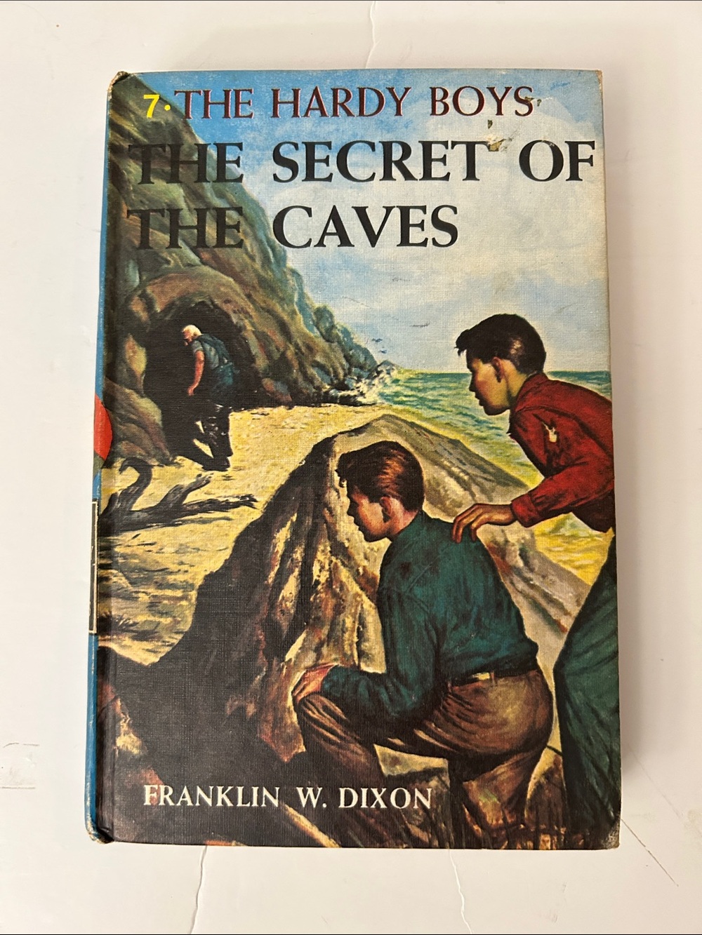 The Secret of the Caves - Vintage Hardcover (Blue/Red Cover)